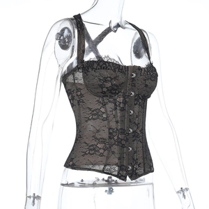 Detailed close-up of intricate black lace corset top with silver metal front clasps