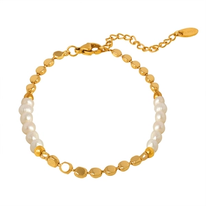 Polished stainless steel gold bracelet featuring freshwater pearls and round metal beads