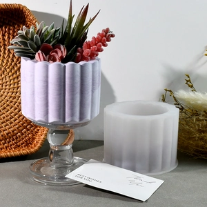 Macro detail of cylindrical silicone mold and purple marble texture succulent flower pot