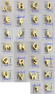 Detailed size chart for 26 gold balloon alphabet beads showing precise millimeter dimensions