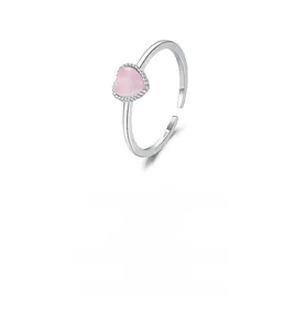 Detailed view of S925 sterling silver stamp on minimalist pink heart open ring band
