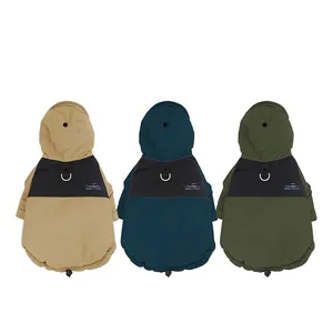 Waterproof outdoor dog jacket with hood and D-ring in khaki, navy, and army green