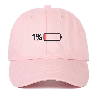 Close-up of 1% battery embroidery on pink cotton baseball cap with twill texture