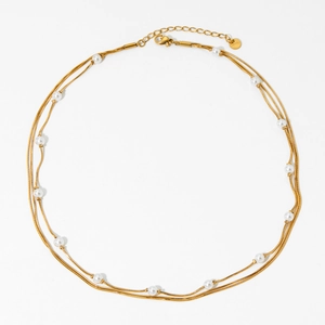 Three-layer gold stainless steel snake chain necklace with elegant white pearl accents
