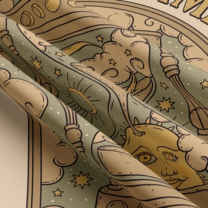 Detailed close-up of thick woven fabric texture on a celestial sun and moon tapestry