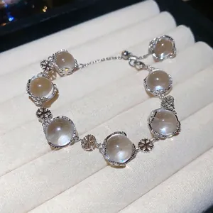 Elegant beaded bracelet with crystal beads and silver snowflake charm for women