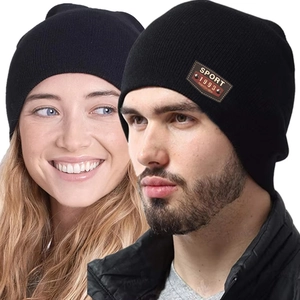 Detail of classic knit beanie with leather SPORT 1993 patch and soft fleece lining