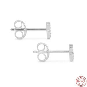 Detail view of S925 sterling silver studs with butterfly backs and clear cubic zirconia