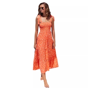 Elegant orange polka dot midi dress with adjustable tie straps and tiered skirt