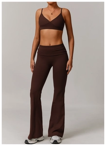 Detail of dark brown V-neck sports bra and high-waist flared yoga pants set
