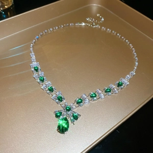 Detailed Y-shaped necklace with rectangle clear stones and green teardrop pendant