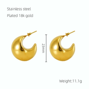 Detail view of 23mm 18k gold plated stainless steel hollow C-shaped drop earrings