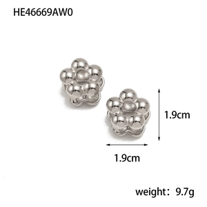 Detail view of silver floral stud earrings with beaded texture and size measurements