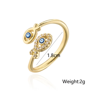 Gold plated open ring with evil eye design and fish shape featuring clear zircons