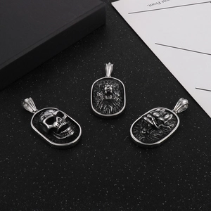 Gothic punk pendants featuring lion, skull, and wolf head motifs in retro silver finish