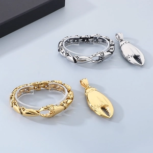Ensemble détaillé de bracelets et pendentifs pince de crabe en acier argenté et or