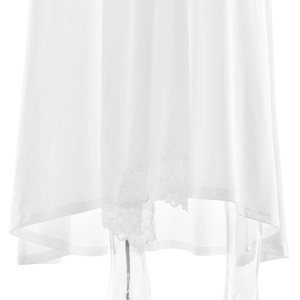 Detail of elegant white dress hem with intricate lace trim on lightweight fabric