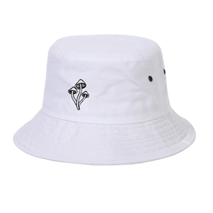 White washed cotton bucket hat featuring black mushroom embroidery and metal eyelets
