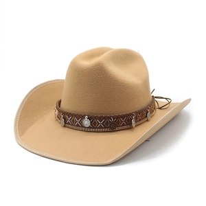 Detail of khaki felt cowboy hat with ethnic woven band and silver coin pendants