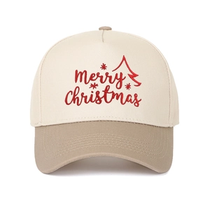 Detail of red Merry Christmas embroidery and tree on contrast panel trucker hat