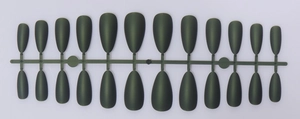 Close-up of matte dark green almond press-on nails in 24 pieces set on a plastic frame