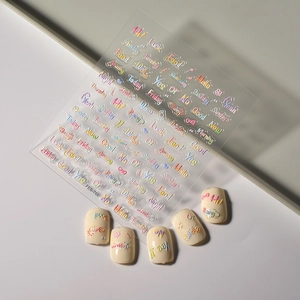 3D embossed nail art stickers with colorful English letters and heart patterns on white nails