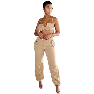 Detail of khaki cropped cargo top with flap pockets and matching jogger pants set