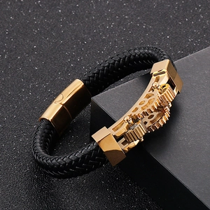 Men's black woven leather bracelet with golden mechanical gears in 45-degree view
