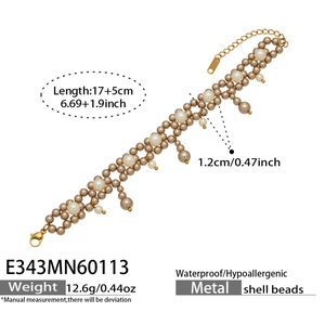 Detail of adjustable 17+5cm gold bracelet with 1.2cm champagne and white shell beads