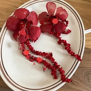 Elegant red velvet flower earrings with sequin heart and long wavy ribbon tassels