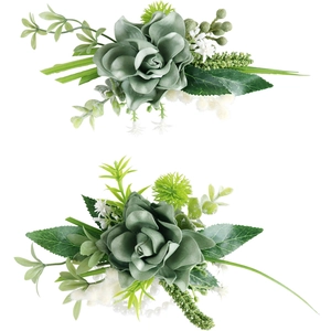 Handmade silk rose boutonniere set with green leaves and white pearls for weddings
