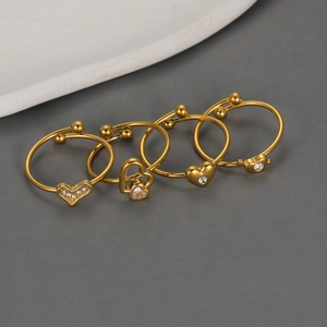 Elegant gold stainless steel heart rings with sparkling crystals in an open design