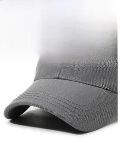 Detail of grey baseball cap featuring a reinforced stiff brim with parallel stitching
