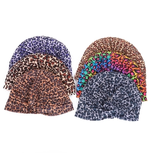 Leopard print pleated turban hats in various colors including purple and brown