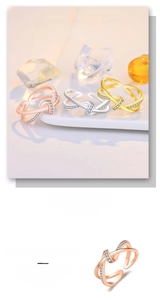 Detail of S925 sterling silver rings set in rose gold, silver, and gold with pavé diamonds