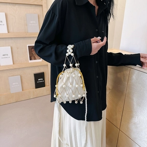 Fashionable white pearl beaded handbag with drawstring satin lining and metal frame