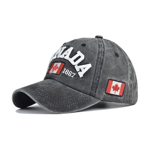 Detailed close-up of Canada 1867 embroidery on washed cotton grey baseball cap