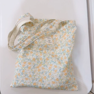 Floral canvas tote bag with soft cream velvet finish and vintage pastoral flower pattern