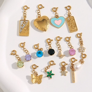 Various 18K gold-plated charms with heart, star, and gemstone details for DIY jewelry