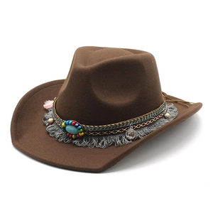 Dark brown wool felt western cowboy hat with bohemian tassels, beads and feather detail