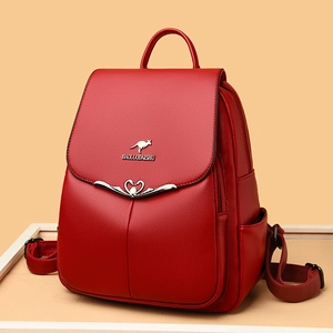 Elegant red textured leather backpack with top handle and adjustable straps for women