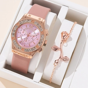 Elegant rose gold watch with pink leather strap and diamond bezel, plus a floral bracelet