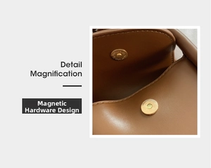Agrandissement détaillé du sac en cuir marron montrant le fermoir magnétique