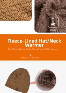 Close-up of brown winter knit hat featuring thick fleece lining and mountain logo patch