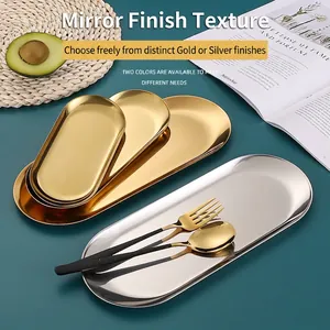 Minimalist oval stainless steel trays in gold and silver finish with polished mirror surface