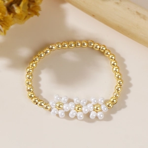 Handmade woven daisy flower beaded ring with gold copper beads for a casual women's style