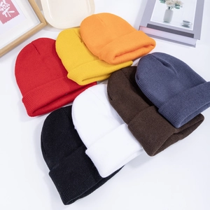 Classic plain knit beanie hats in multiple vibrant colors for men and women