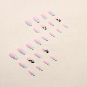 French leopard print almond press-on nails with gold glitter lines in lake green and pink
