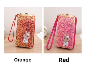 Detailed view of sequined crossbody phone bags in orange and red with rabbit patches