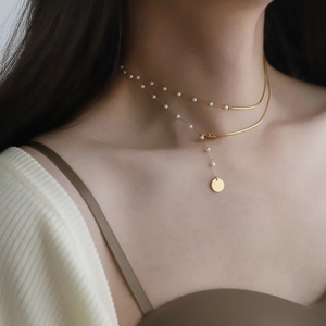 Double-layer vintage French pearl necklace with gold snake chain and round pendant